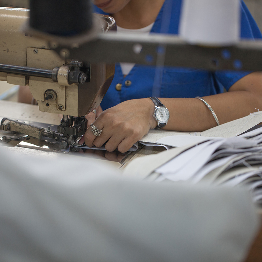 Sewing the recovered textile at the social workshop